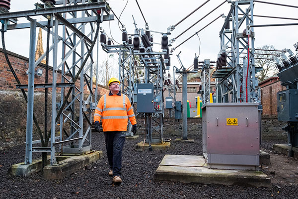 Engineer walking in substation